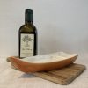 Olivenöl fruchtig pikant und Keramikschiffchen orange
